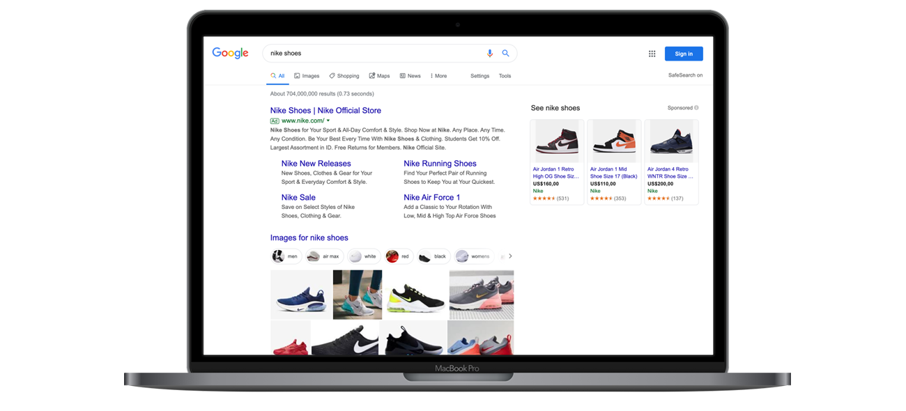 An open laptop screen showing Google SERP for shoes. 